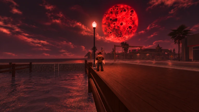 BlockSpin waterfront at night beneath a large glowing red Blood Moon